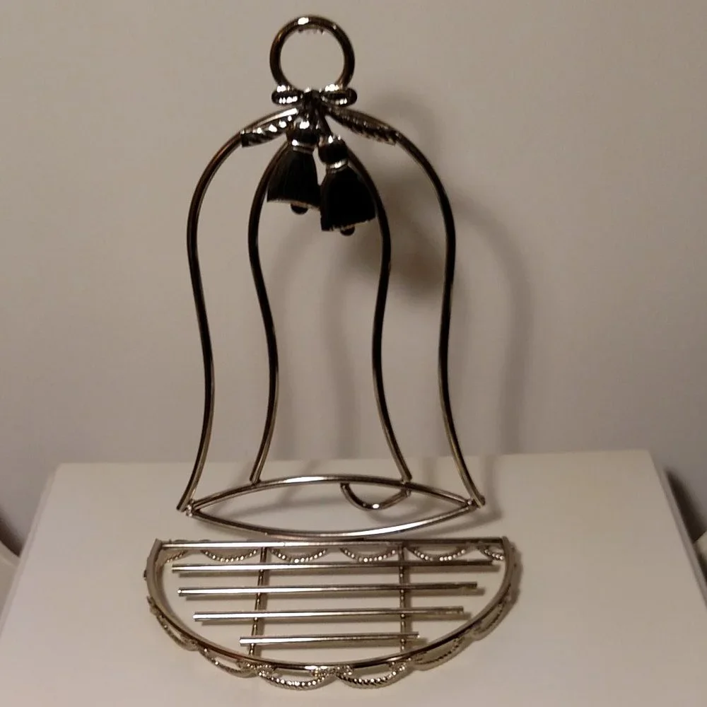 Bell shaped, gold tone metal, semi-circle shelf in excellent condition